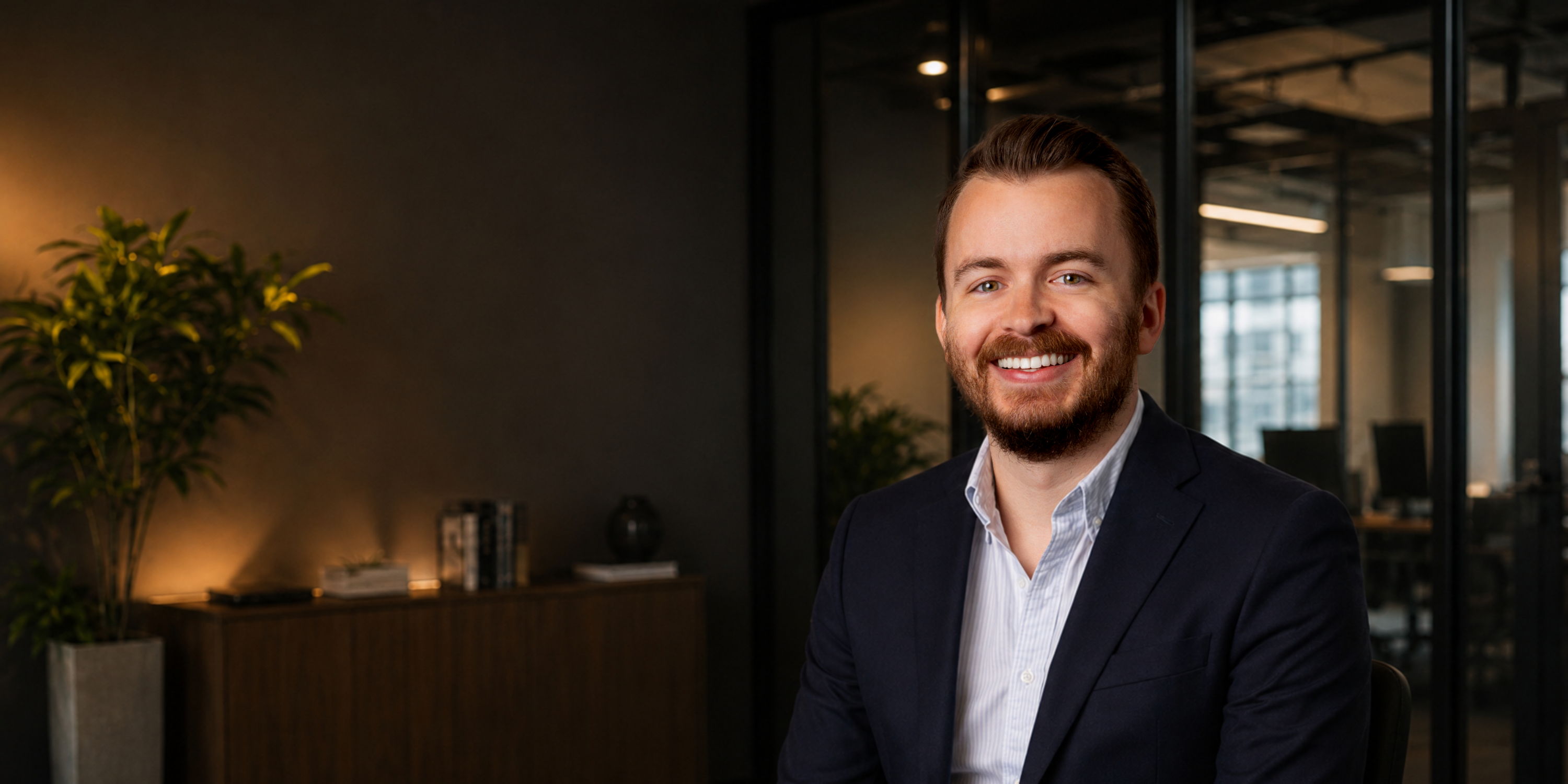 Andrew Grojean in a warm studio setting